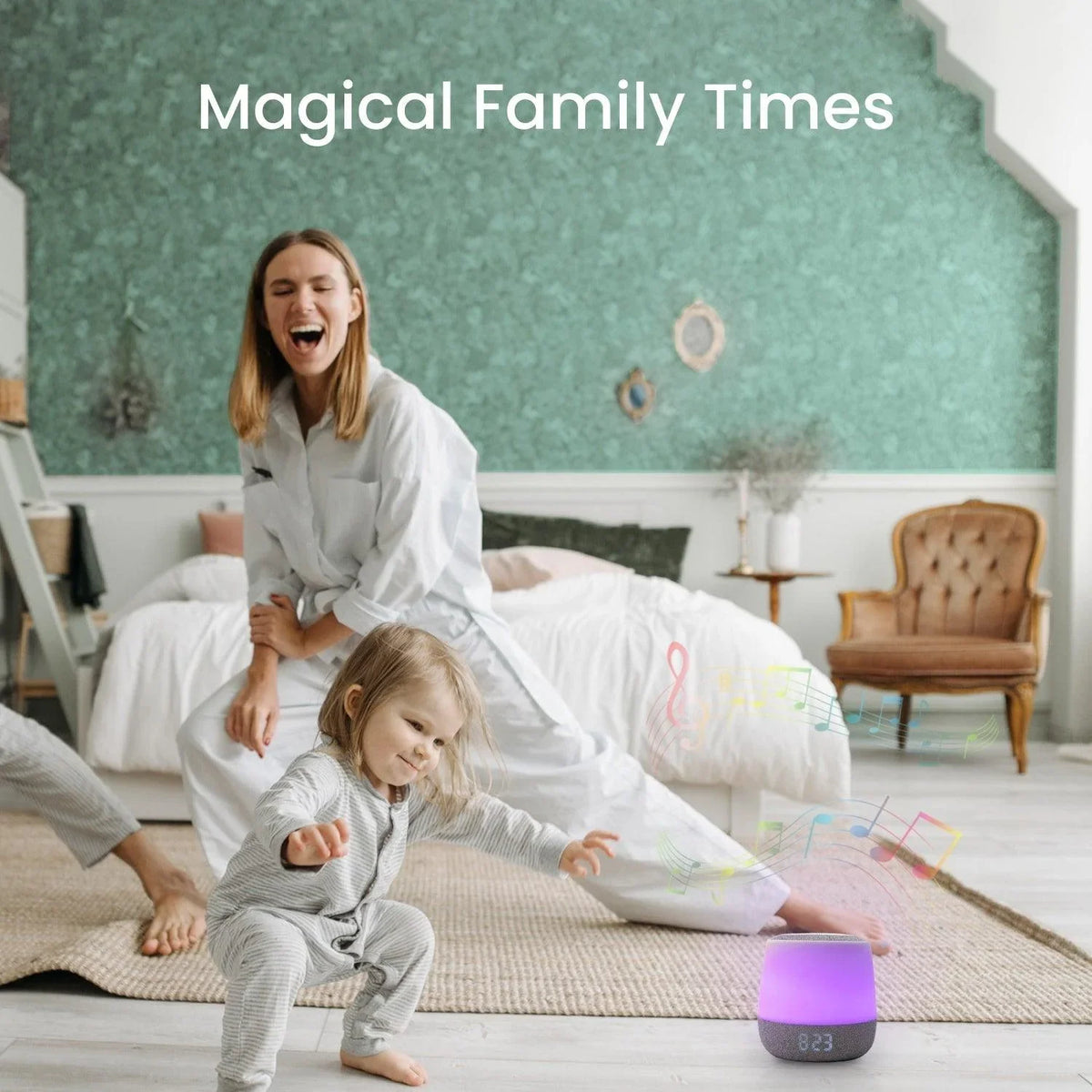 A mom and child play in a bedroom with a glowing sound machine on the floor, representing the Babysense 3 in 1, a comprehensive video baby monitor with two HD cameras and two smart sound and light machines