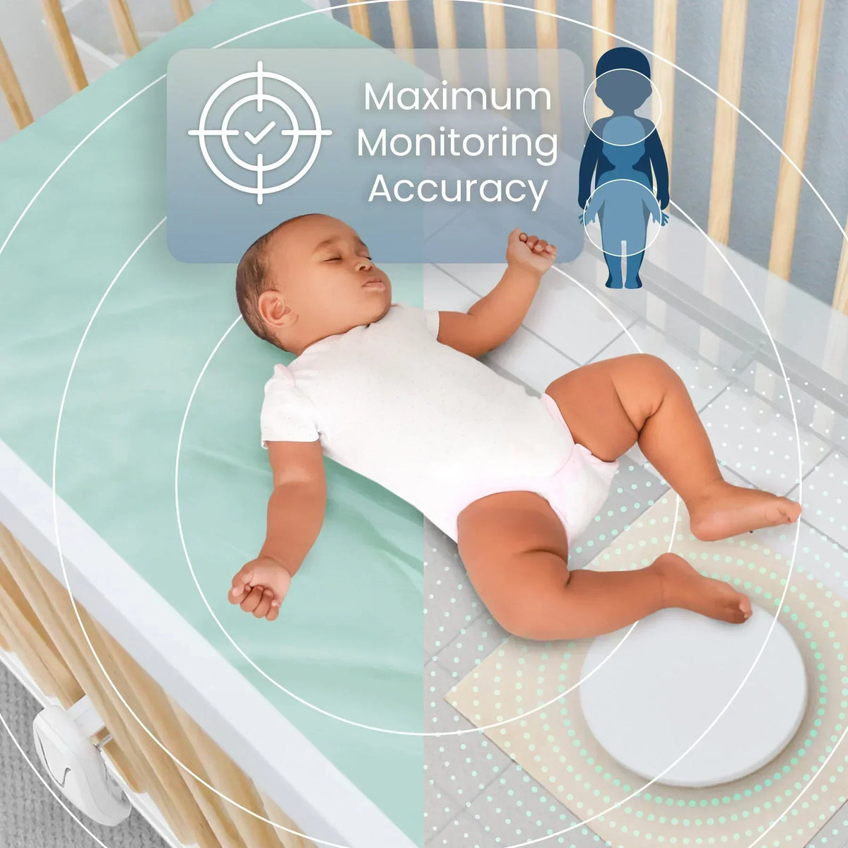 A sleeping baby wears a white onesie, lying in a crib with a Babysense True Sleep video baby monitor pad beneath, indicating maximum monitoring accuracy for advanced sleep tracking