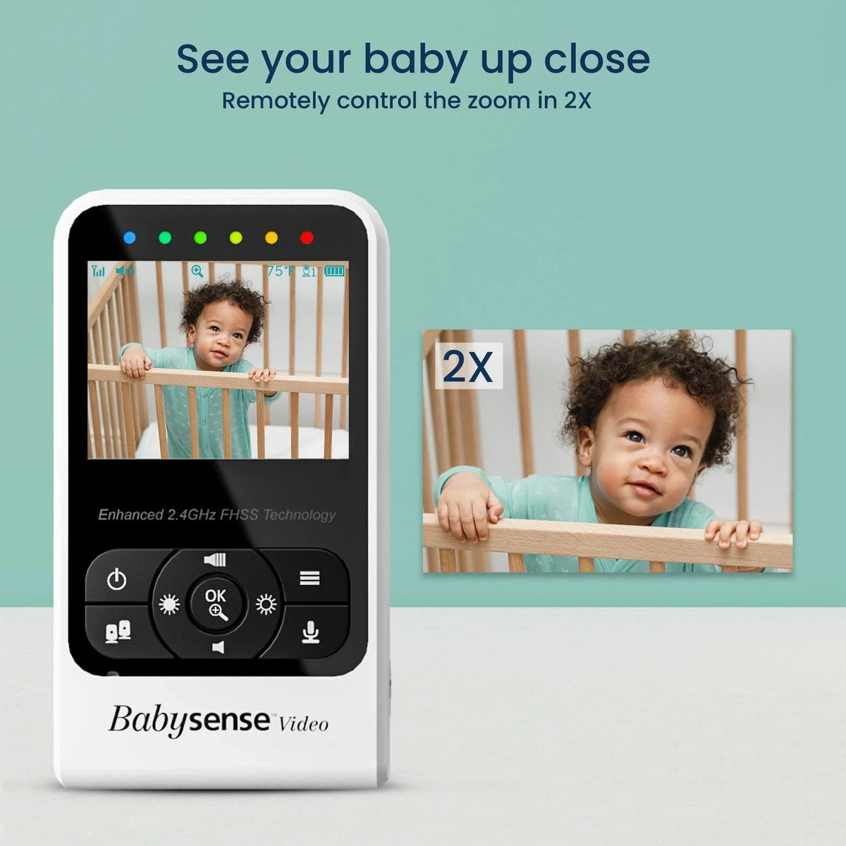 A white Babysense 7 & V24 video baby monitor displays a baby in a crib, with a clearer, zoomed-in view of the smiling baby presented next to the monitor, highlighting the remote 2X zoom function