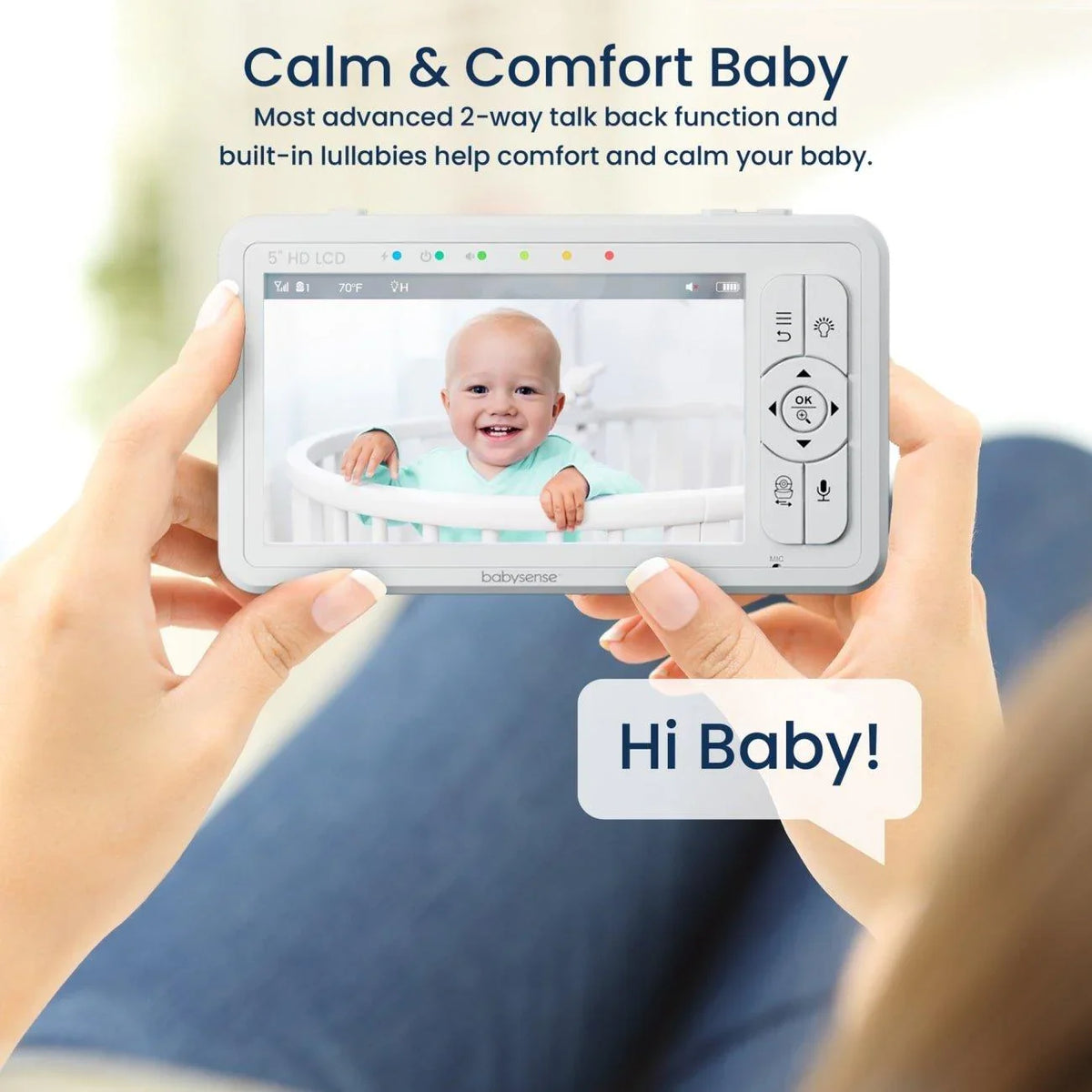A parent's hands hold a white Babysense True Sleep video baby monitor, displaying a cheerful baby in a crib on its 5" HD LCD screen, with a "Hi Baby!" speech bubble beside it, illustrating the advanced 2-way talk back function of the baby monitor